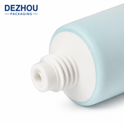 ABL skincare tube with rounded bottom design