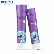 Orange ABL kids toothpaste tube with doctor cap