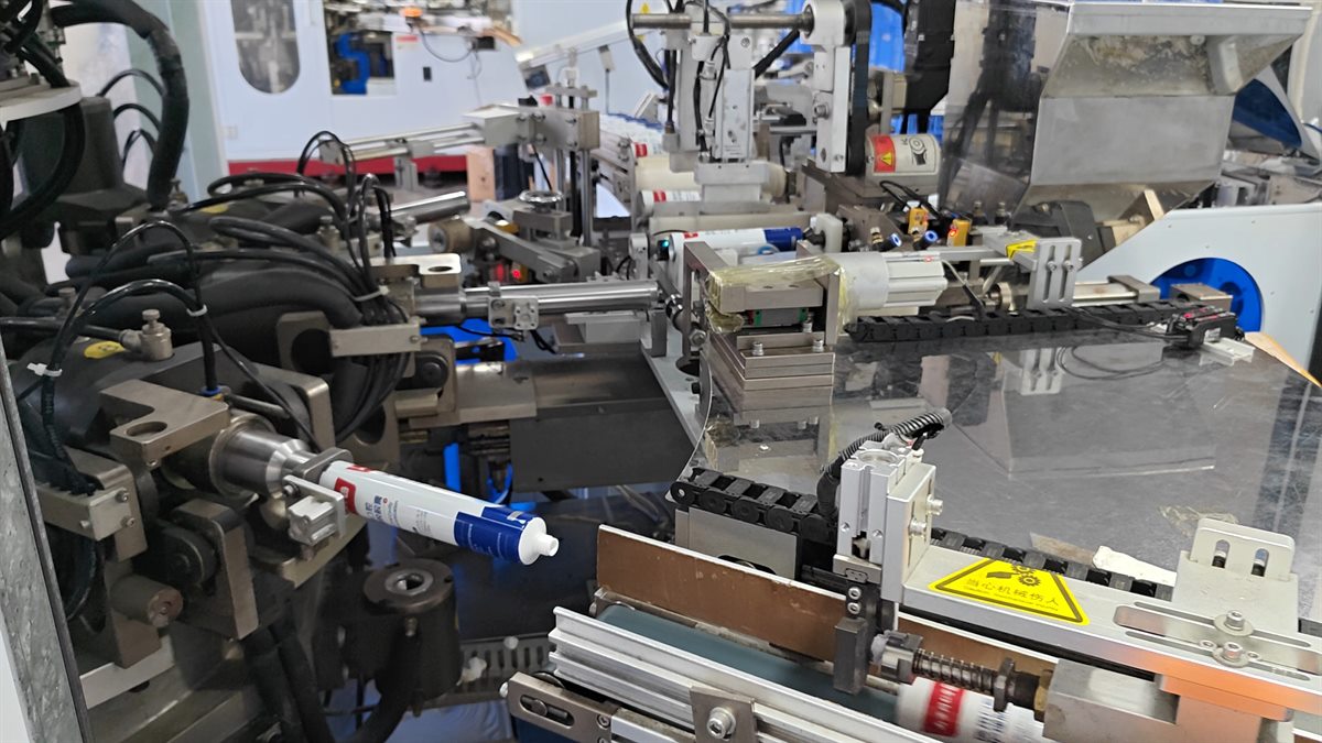 Automated cosmetic tube production equipment
