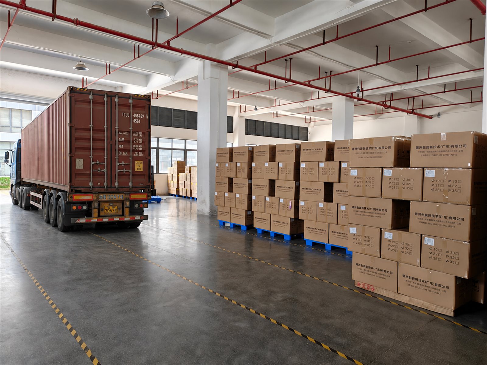 Finished cosmetic tube orders prepared for container shipment